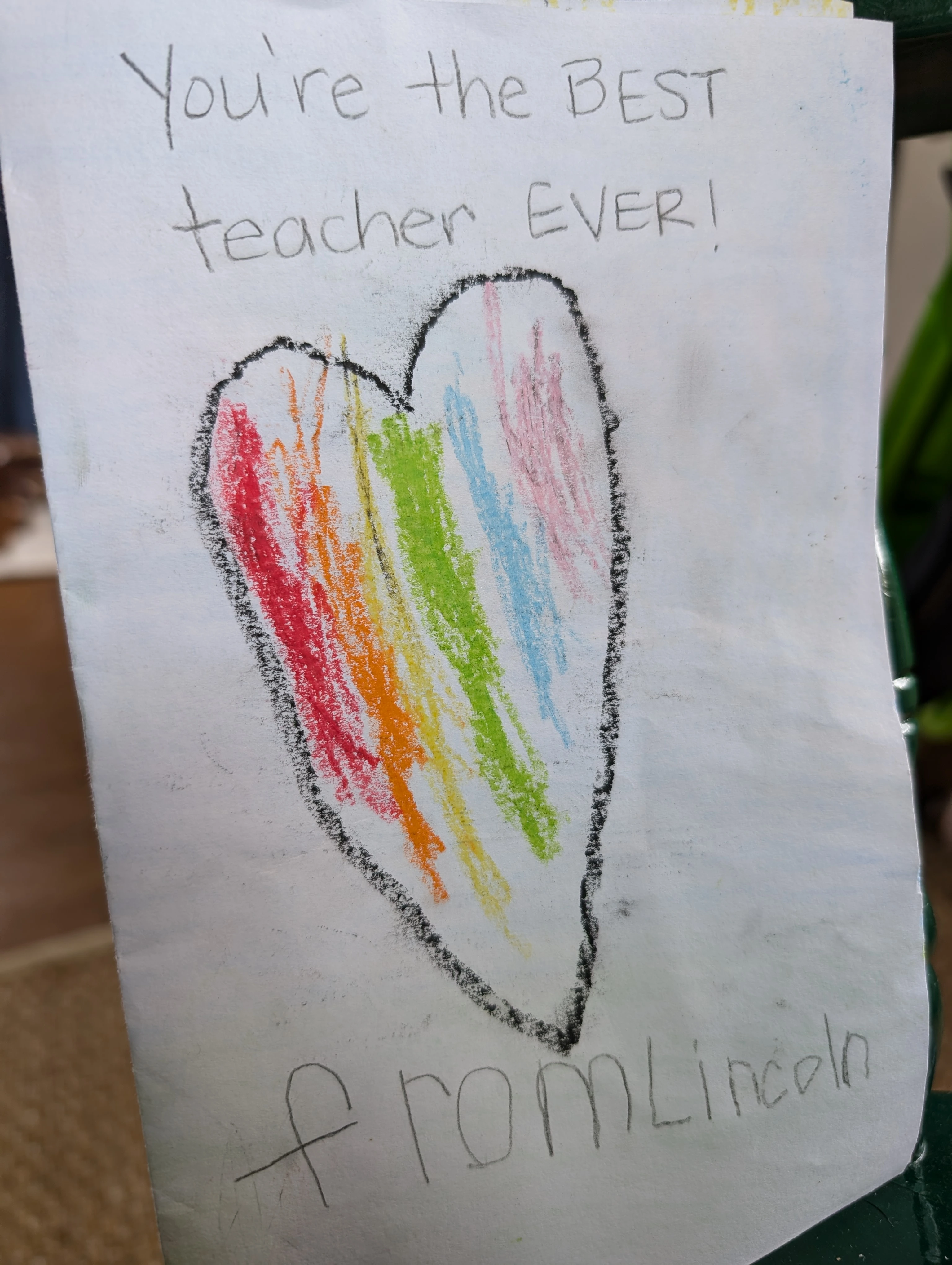 A thank you message with a big rainbow heart