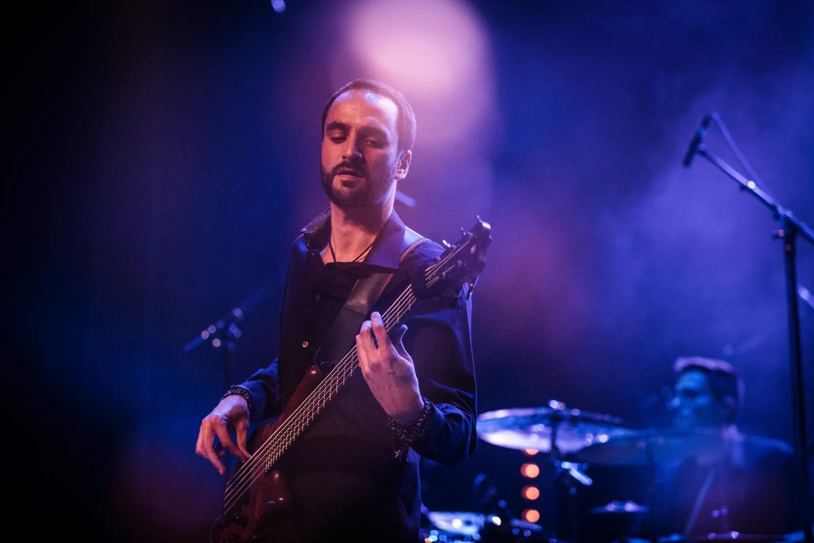 Thibaut Gascon playing bass on stage